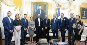 Erick Vega and his wife Diana (far left), with president elect Bukele (center left) standing next to Dominican president Danilo Medina (center right)