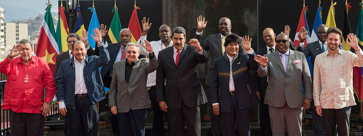 Image of Nicolás Maduro with his fist raised above his head