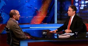 Douglas Farah being interviewed by Jon Stewart on The Daily Show
